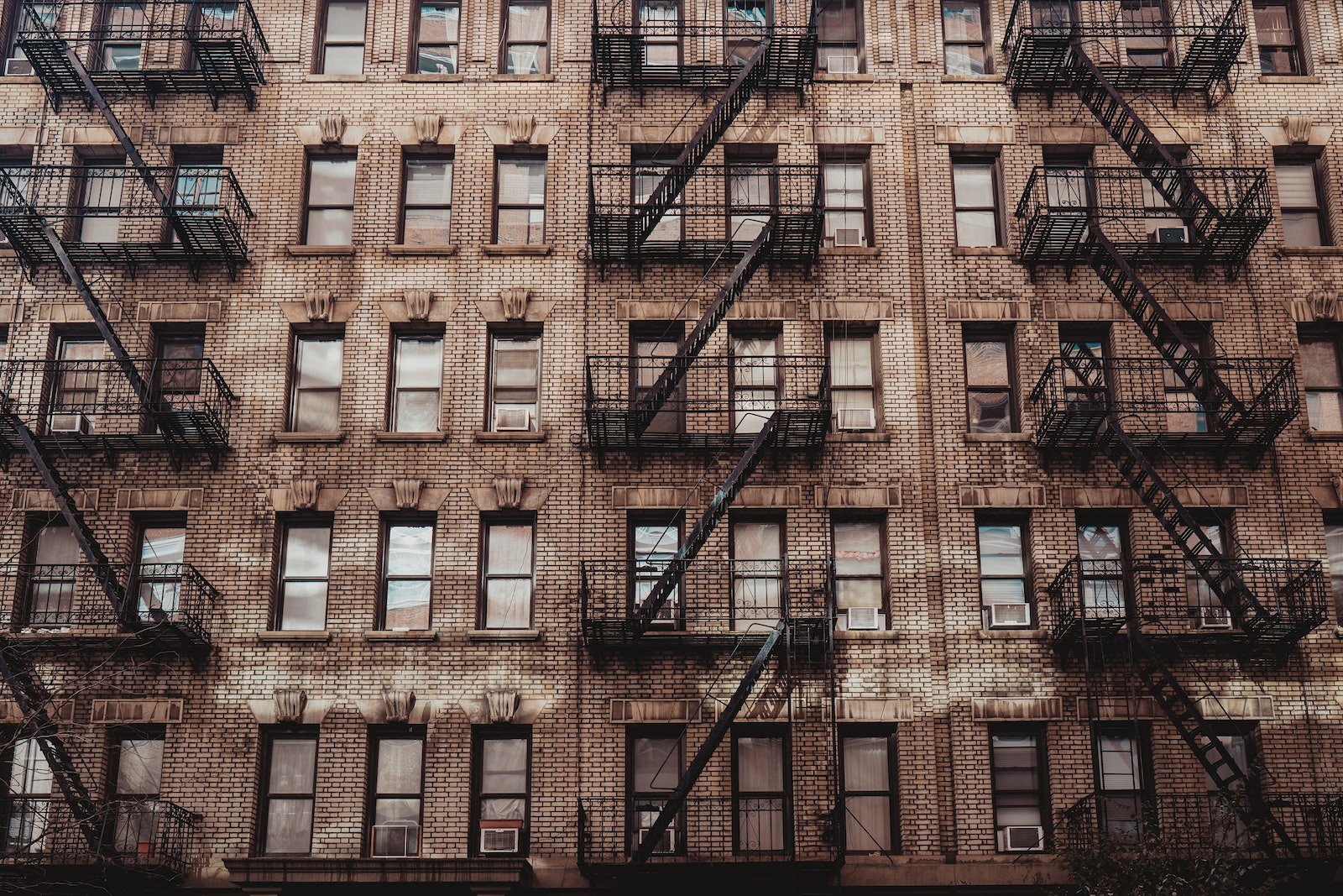 Exterior of residential building with fire escape