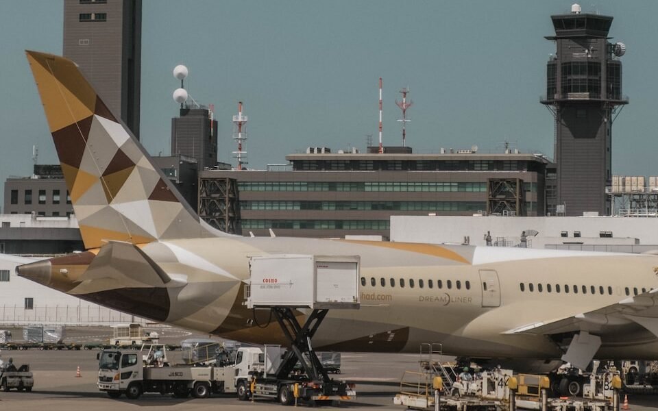 beige airliner on airport