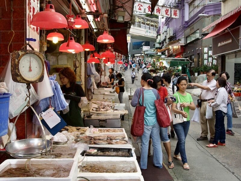 People Walking in Fish Market