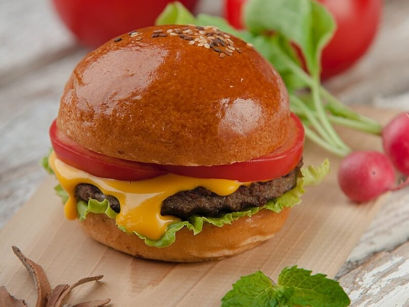 photo of burger with tomato and cheese