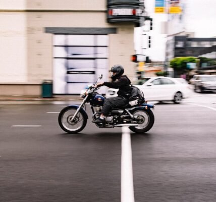 Person Riding Cruiser Motorcycle