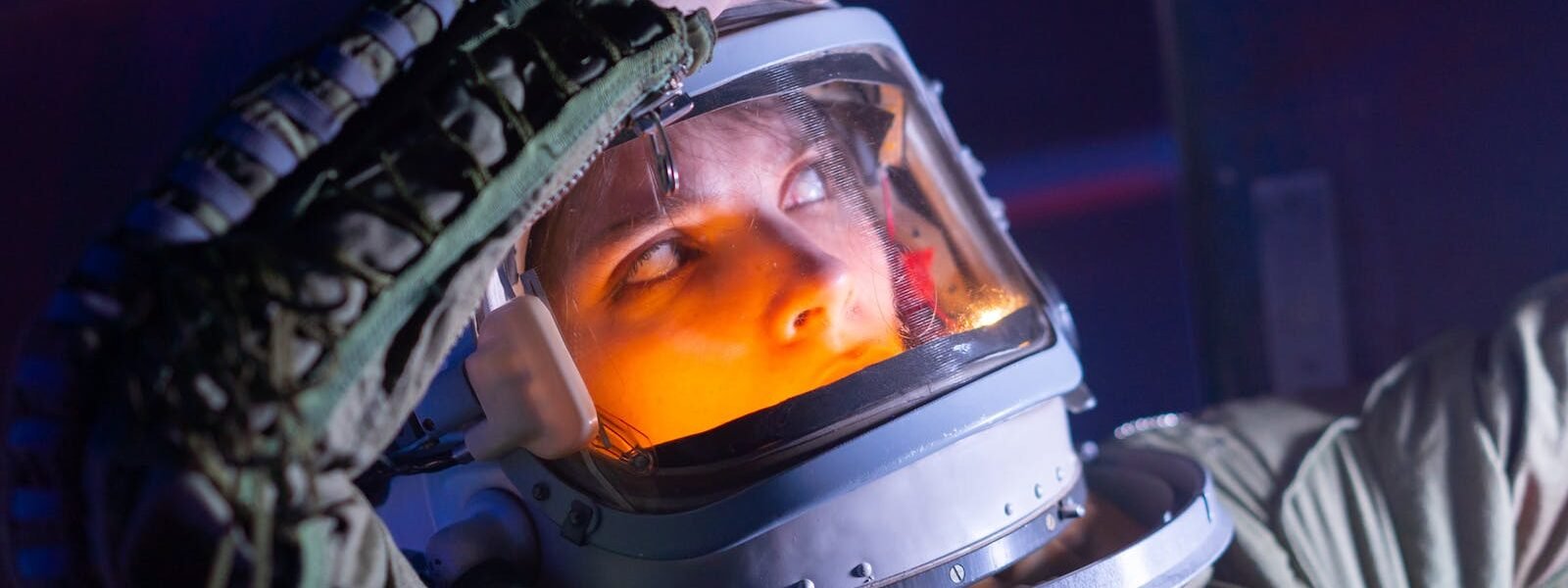 Woman In Spacesuit Looking Surprised